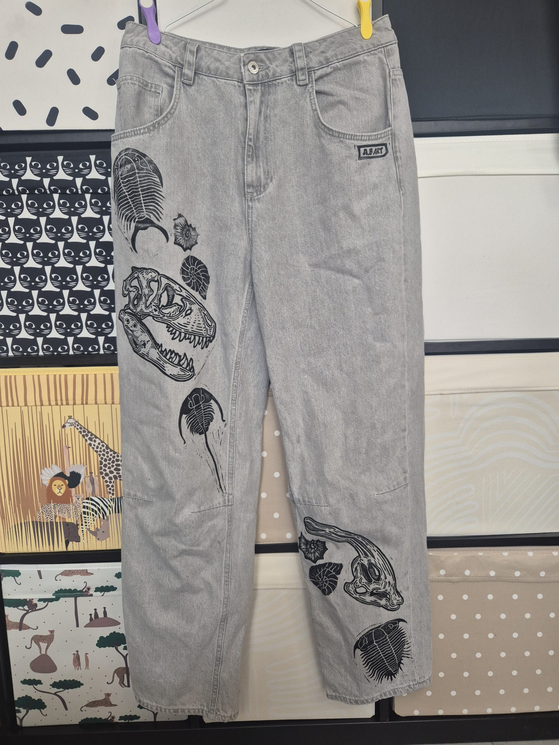 Grey T-rex & Parasaurolophus Skull Upcycled Jeans –  Size UK12 – W34/L30