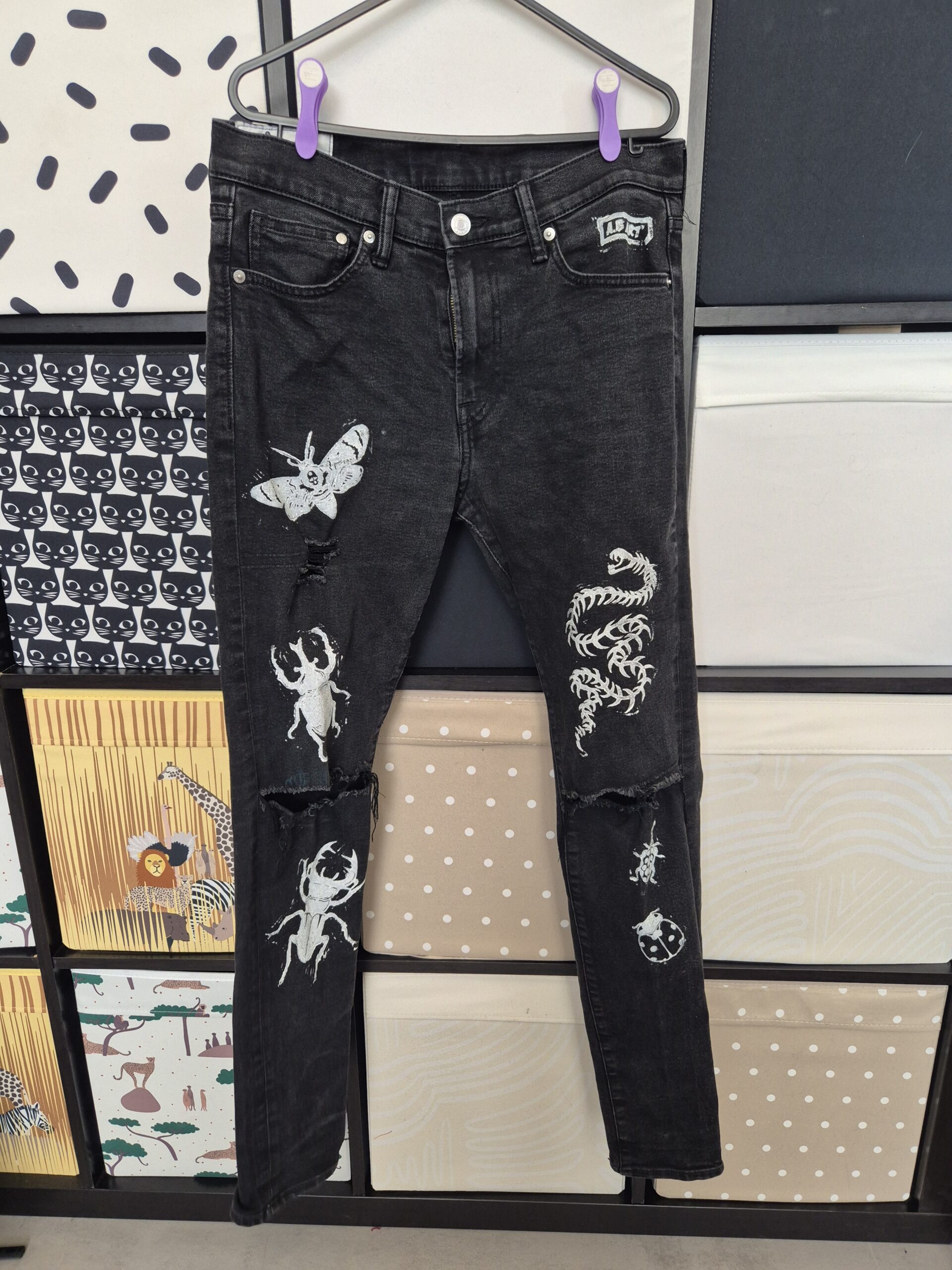 Black Bug Themed Upcycled Ripped Jeans –  Size W32/L32